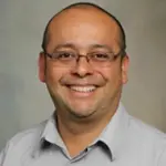 Nestor E. Machare-Delgado, MD, MSCR