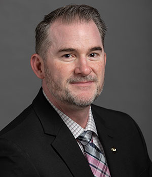 Headshot of Timothy K. Behrens
